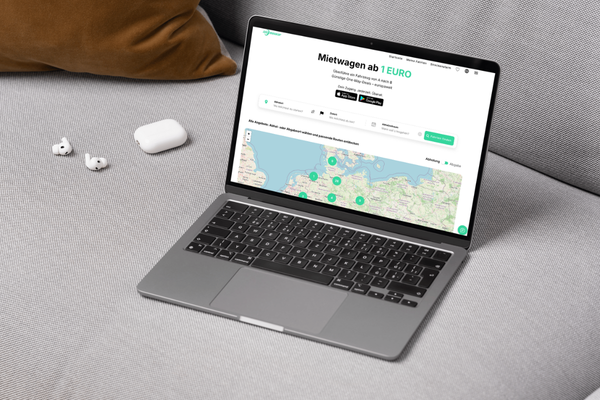 Movacar website on a laptop: search and book rental cars from 1 euro